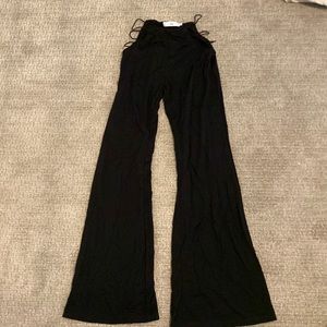 Black Flare Adika Leggings with cut outs on sides. Super cute and flattering.